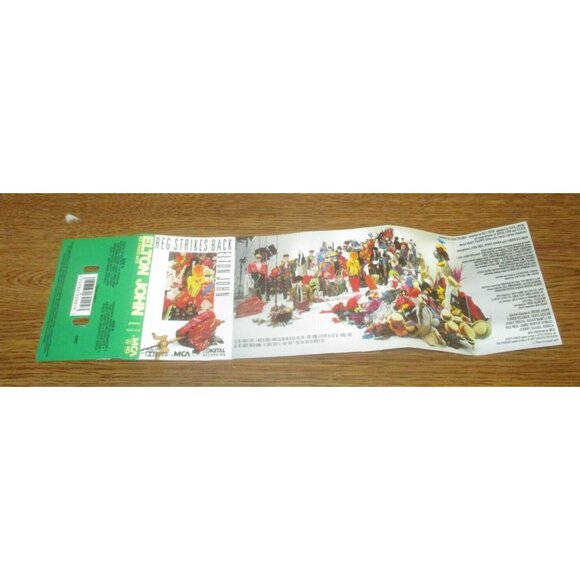 Elton John - Reg Strikes Back on cassette (MCA Records, 1988) - Picture 3 of 4